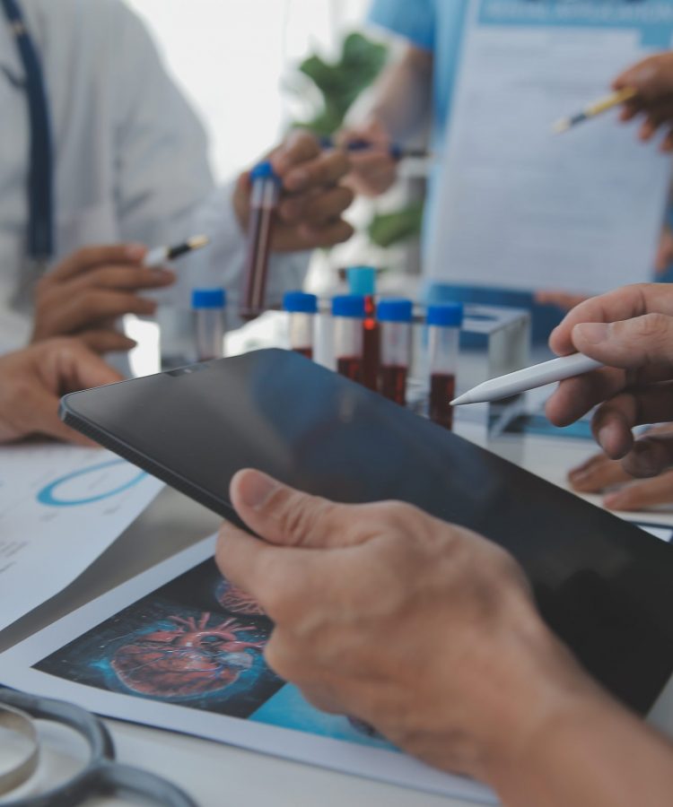 Cropped image of successful medical doctors discussing diagnosis during the conference